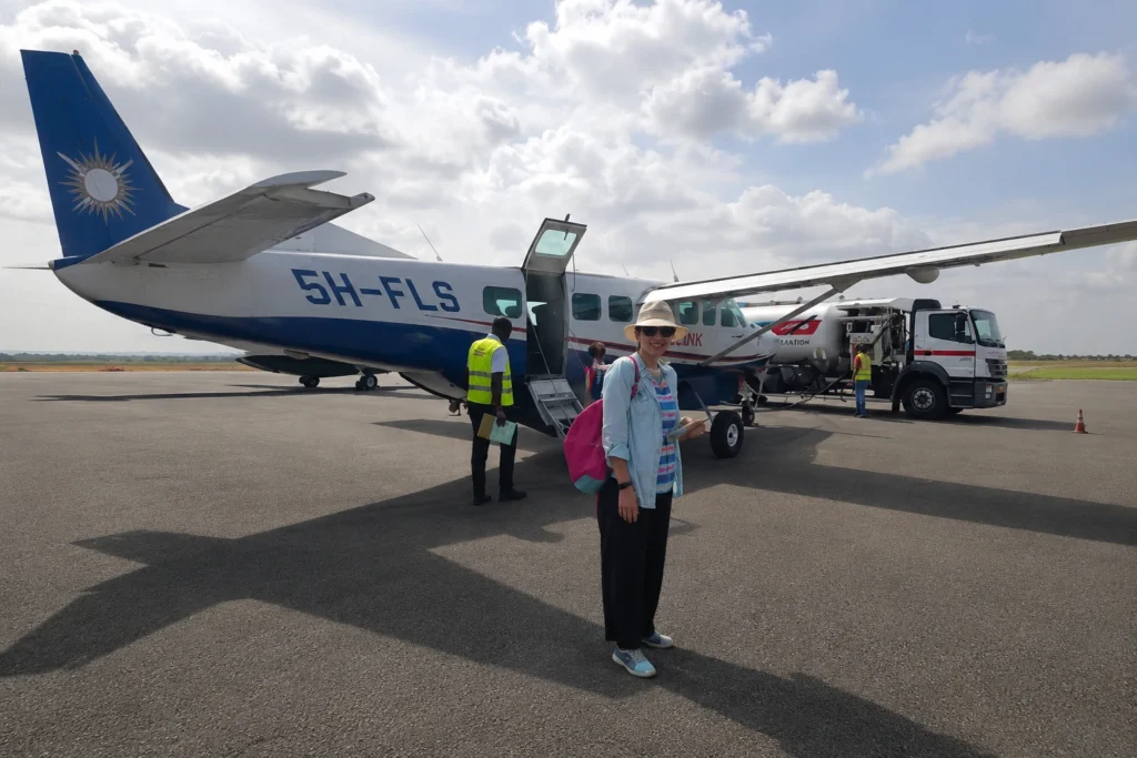 Boarding a small Coastal Aviation propeller plane from Dar es Salaam to Arusha