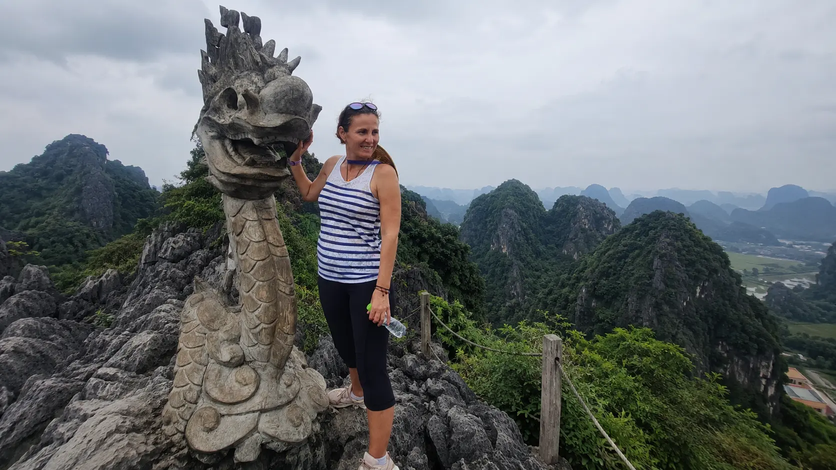 Hanoi Travel Guide:Dragon statue at Mua Cave viewpoint overlooking Ninh Binh