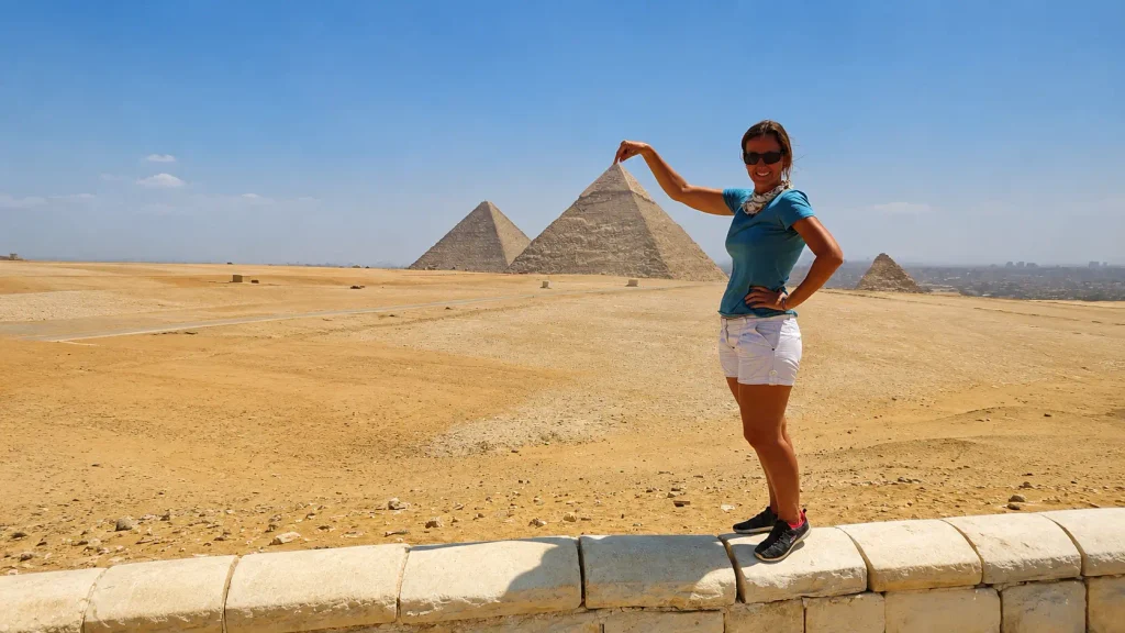 Perspective photo with the Pyramids of Giza on a clear day in Cairo.
