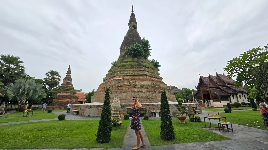 Weathered brick stupa at an old temple complex in Vientiane