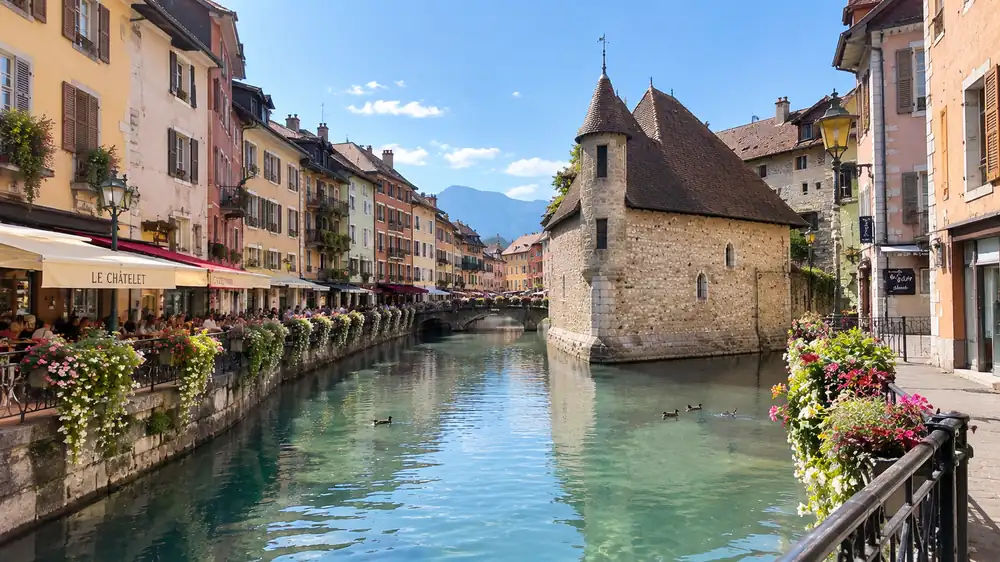 Annecy travel guide old town canal with Palais de l'Isle