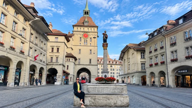 Bern travel guide: the Käfigturm clock tower and fountain on Marktgasse in Bern, Switzerland
