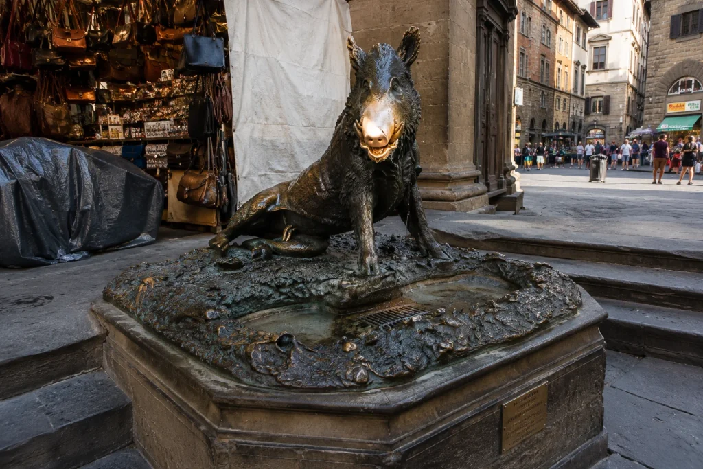 Bronze boar statue at the Porcellino Fountain in Florence