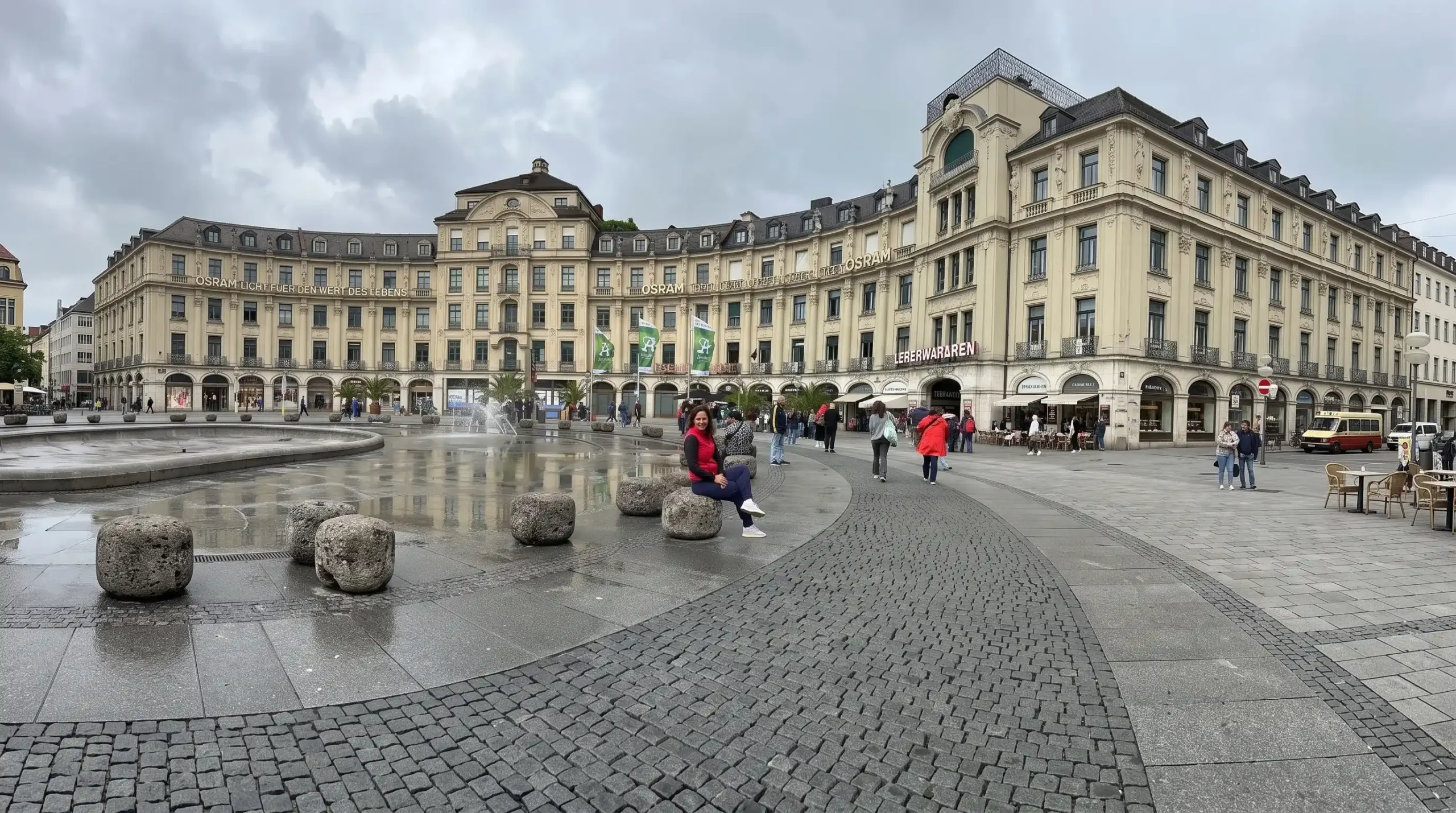 Marienplatz square with historic buildings and fountain, Munich travel guide