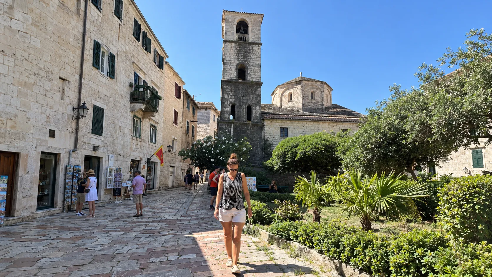 Kotor travel guide: walking through the stone lanes of Kotor Old Town on a sunny July day
